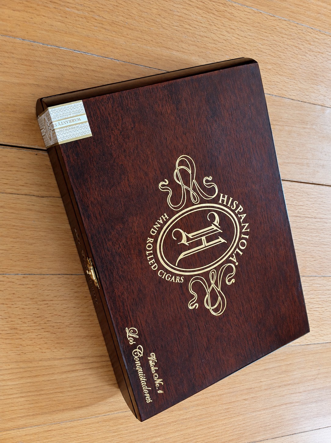 Original Hispaniola cigar box on a wooden table