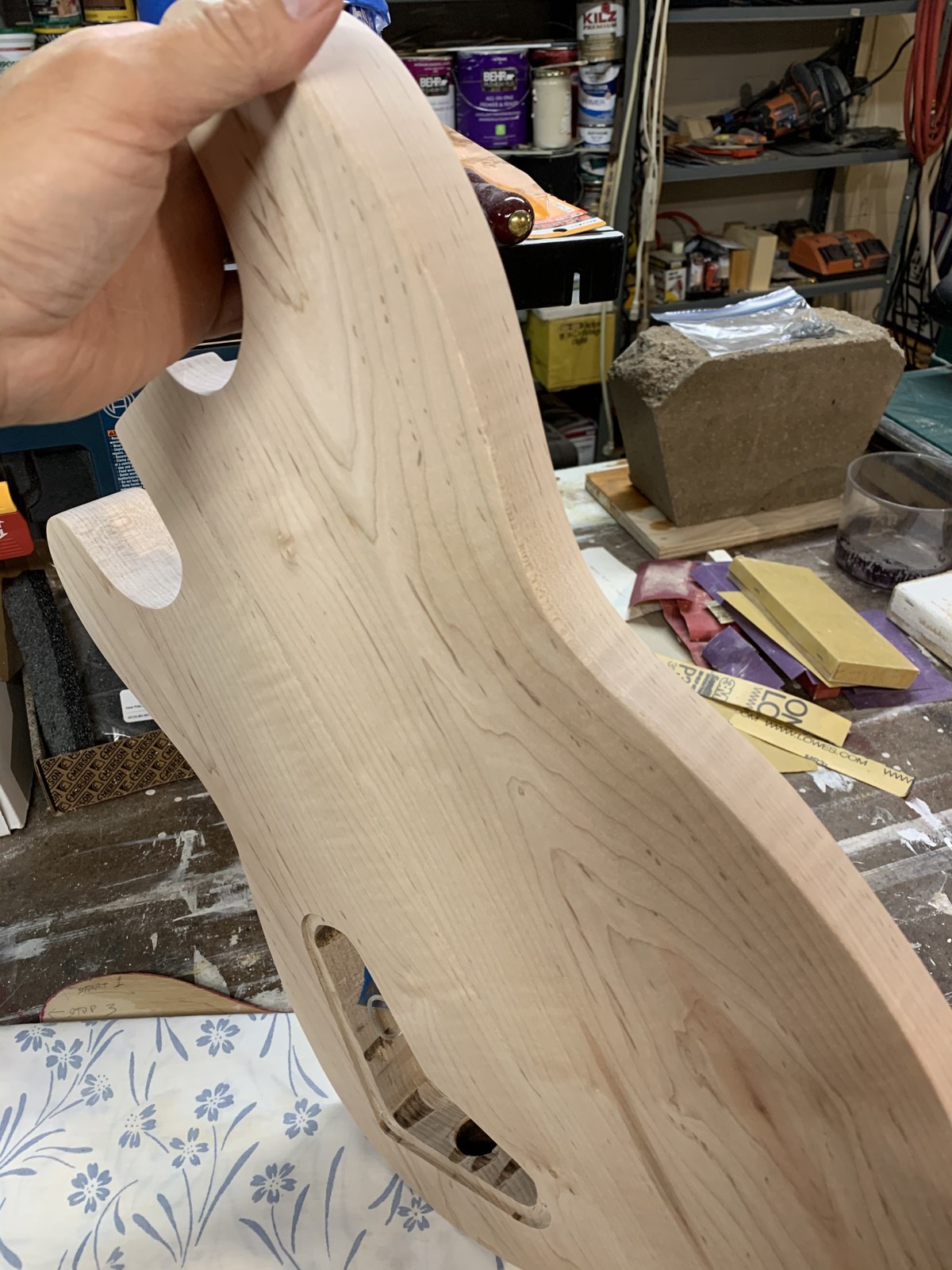 Back of the bare guitar body with a shaped belly contour