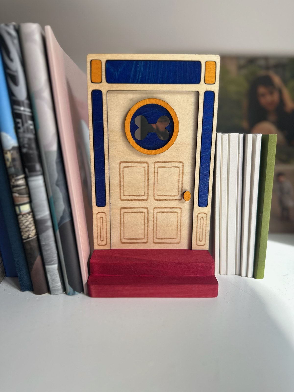 Handmade puppy fairy door displayed on a shelf